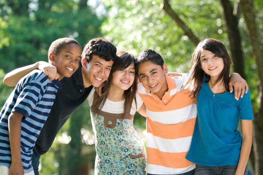 Teens smiling together